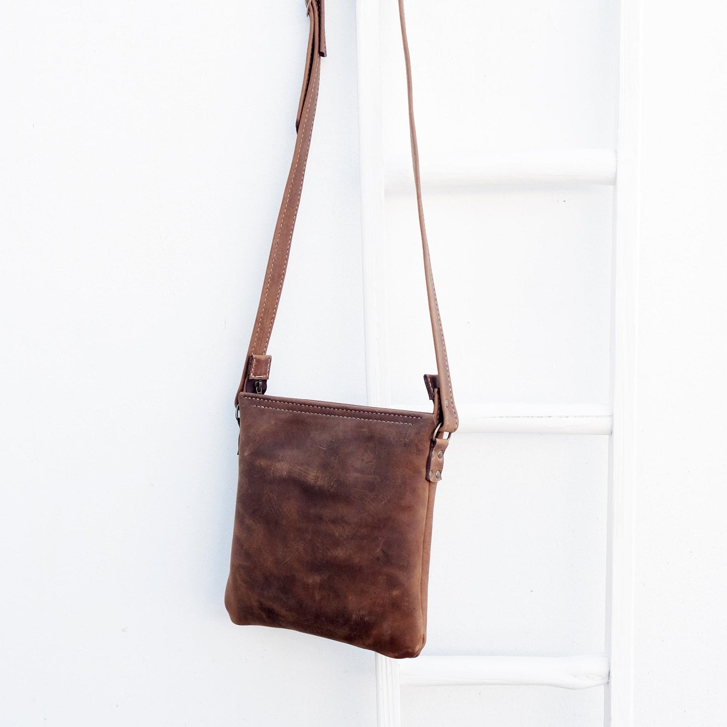 Cross over chocolate brown leather satchel back