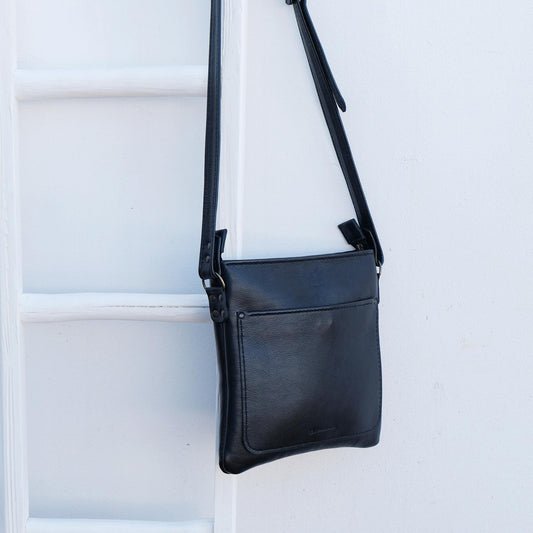 Cross over black leather satchel