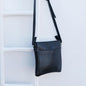 Cross over black leather satchel