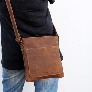 Cross over chocolate brown leather satchel front