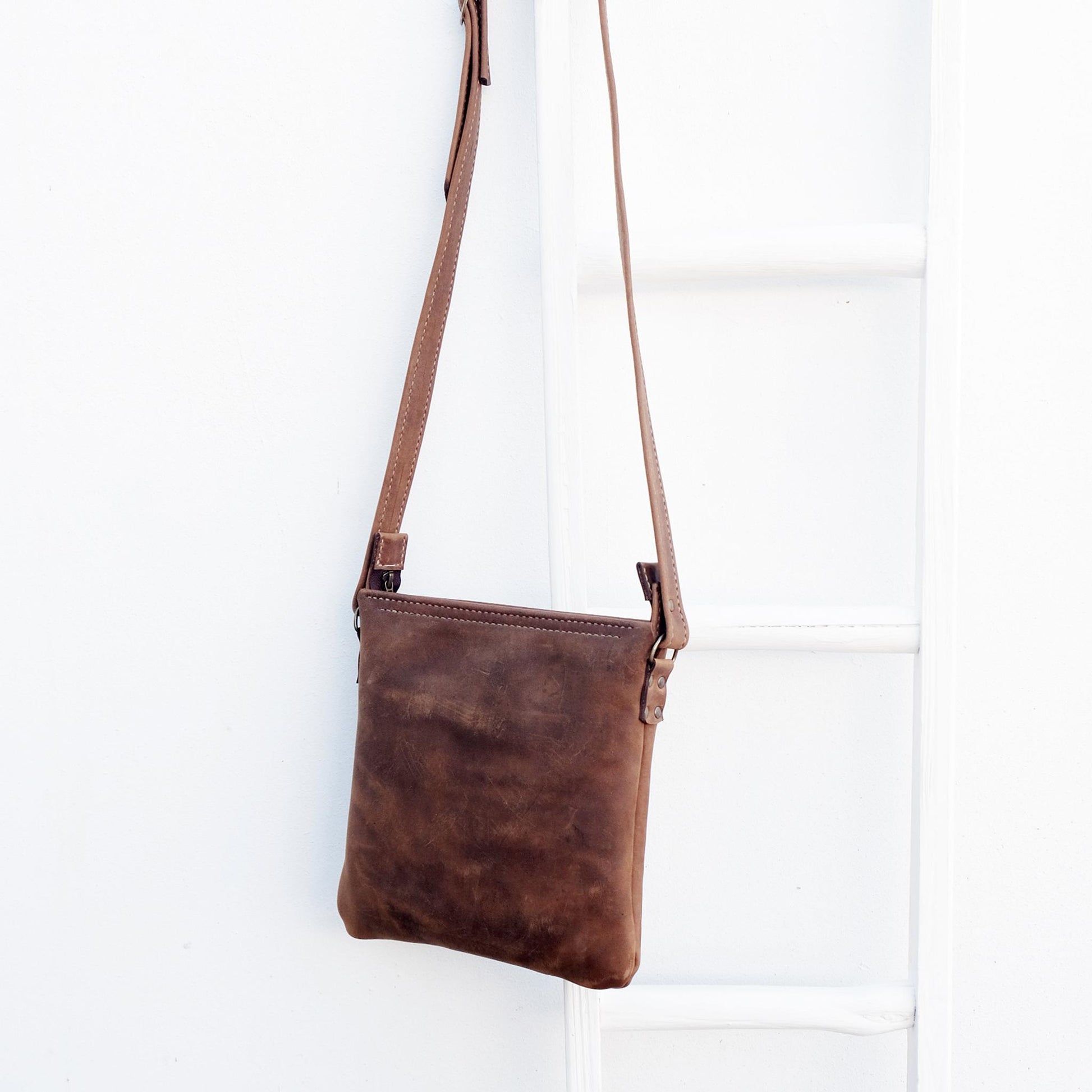 Cross over chocolate brown leather satchel back