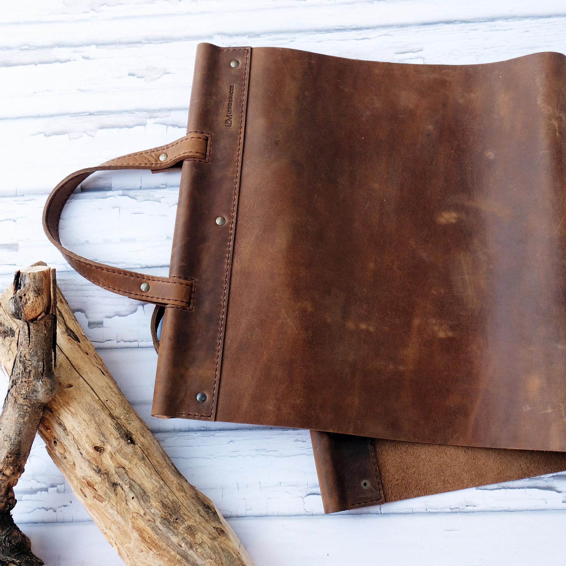 Leather log carrier hand stitched