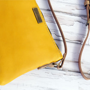 Mustard leather casual sling bag detail